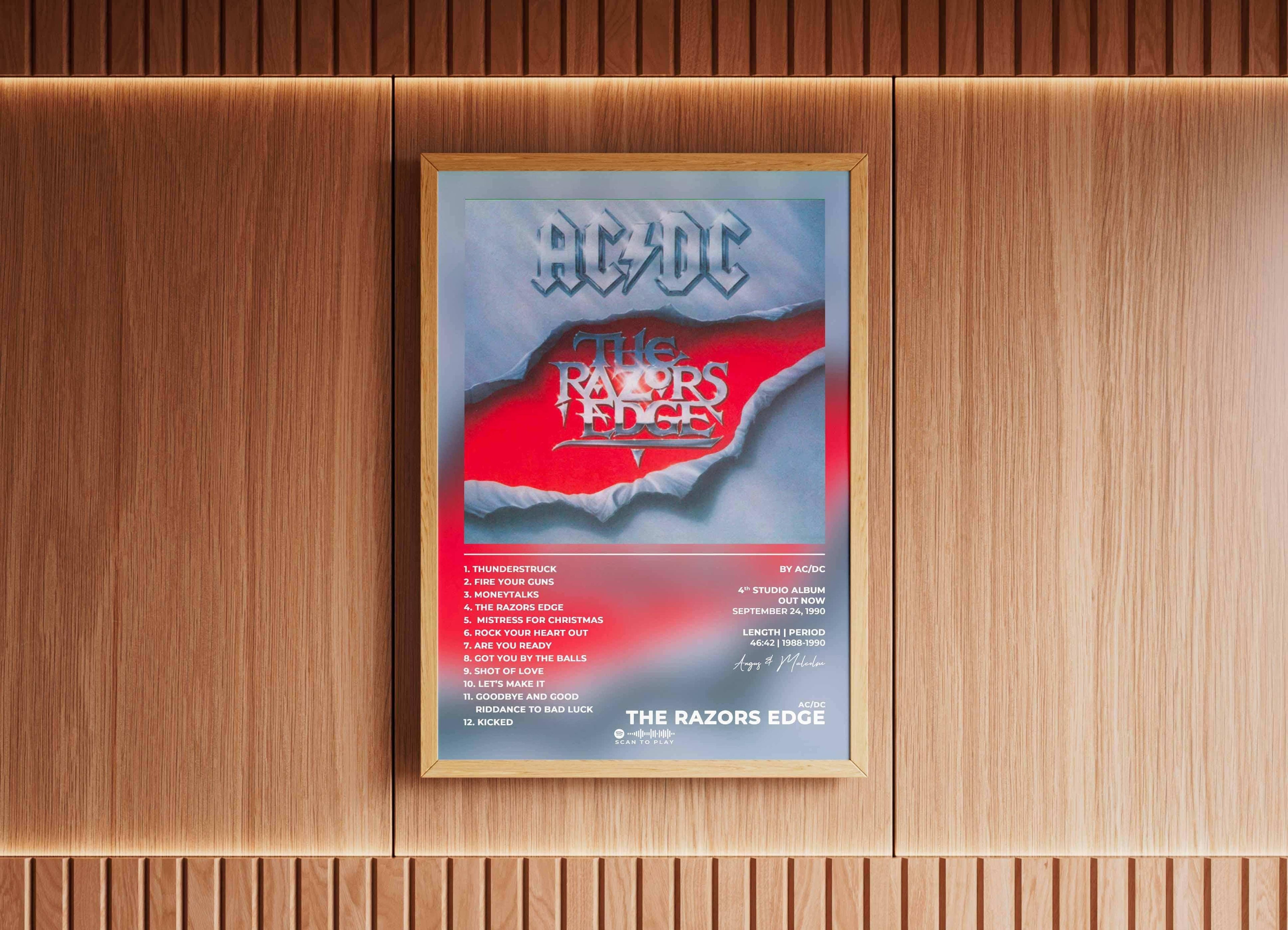 Affiche encadrée AC/DC The Razors Edge accrochée sur mur bois, fait en France, livraison gratuite 48h, cadeau idéal Noël